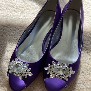 Purple peep-toe flats with gemstone detailing. Size 8.